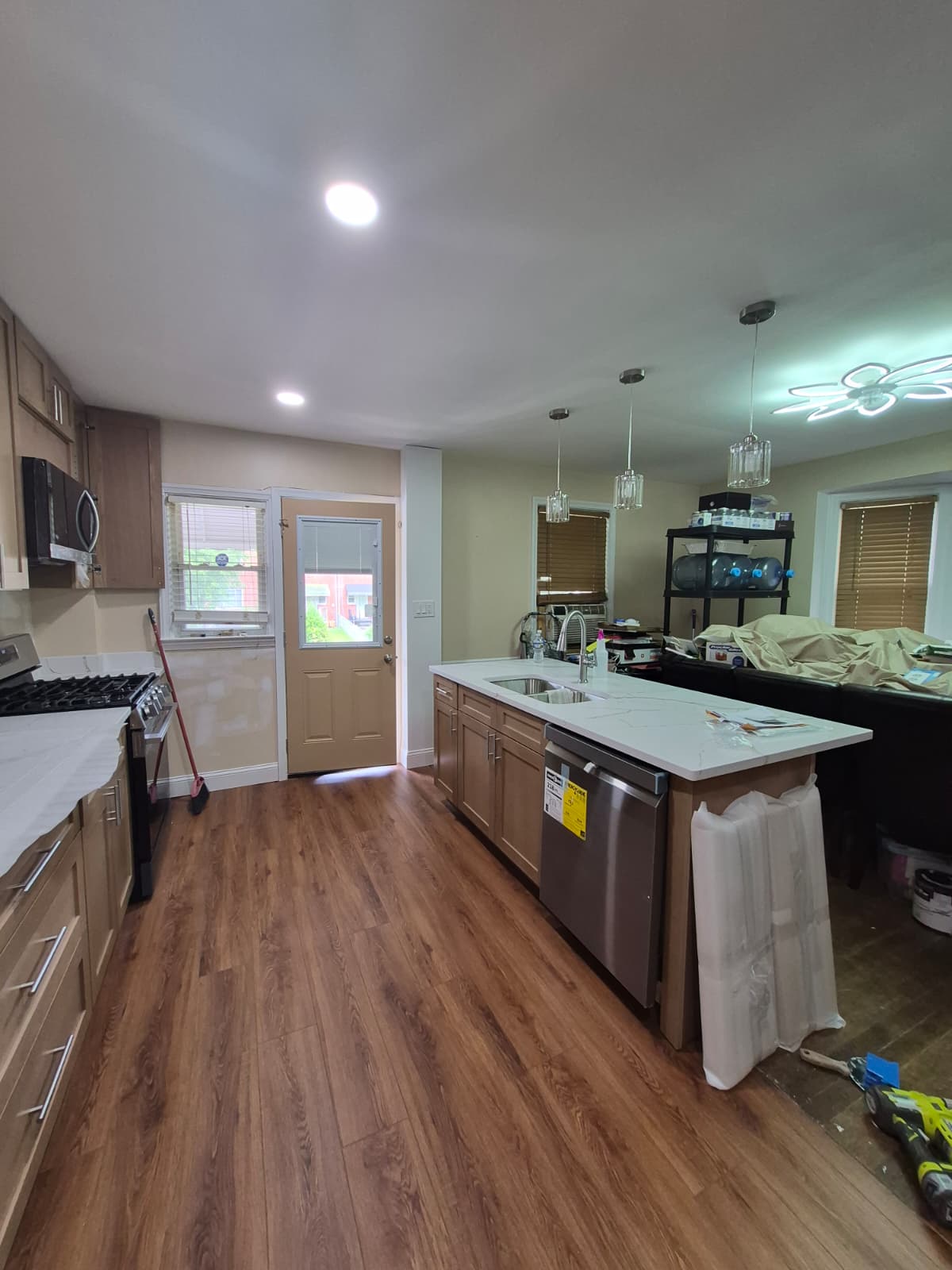 Kitchen after renovation — new cabinets and countertop