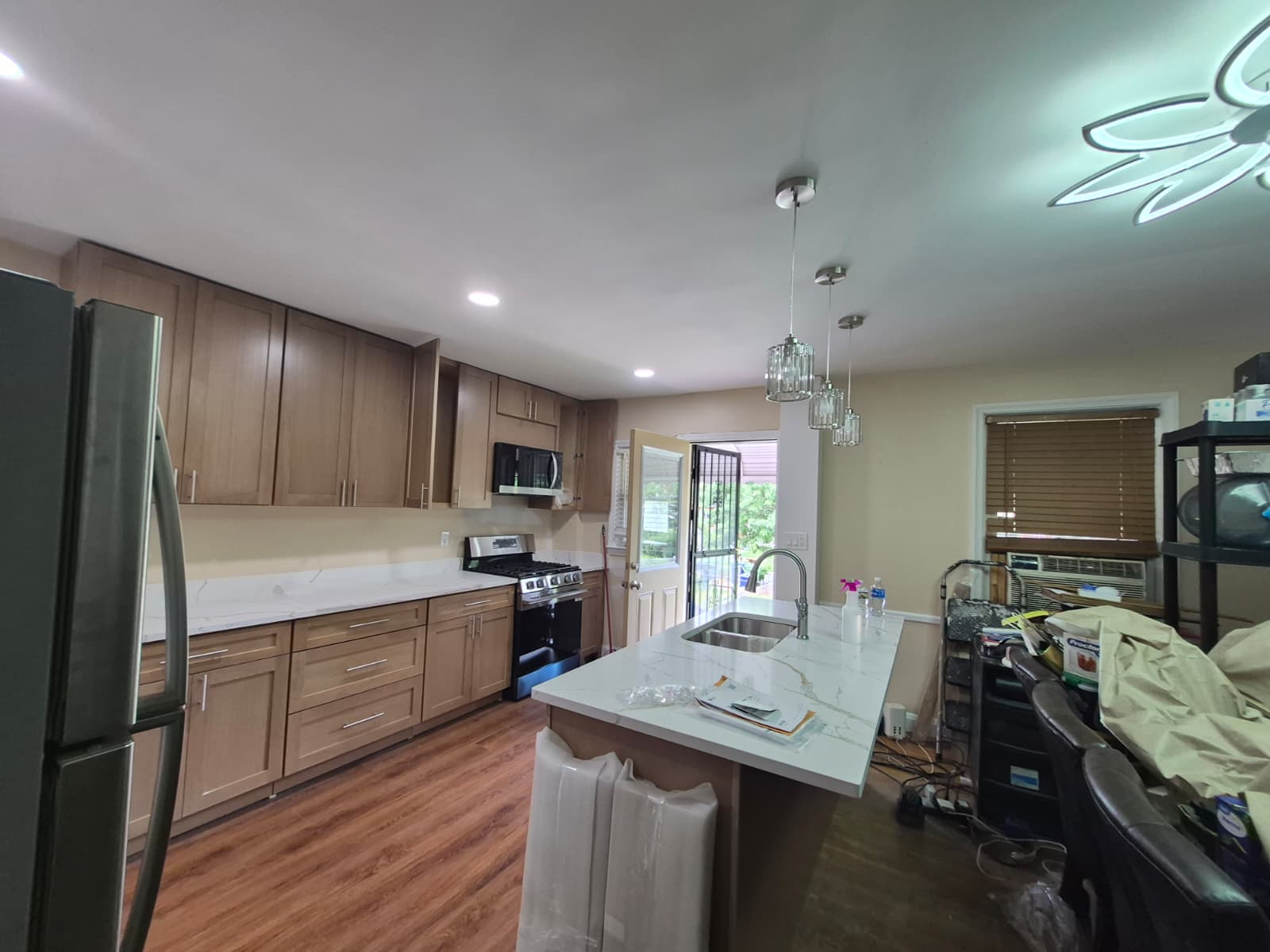 Kitchen after renovation — new cabinets and countertop