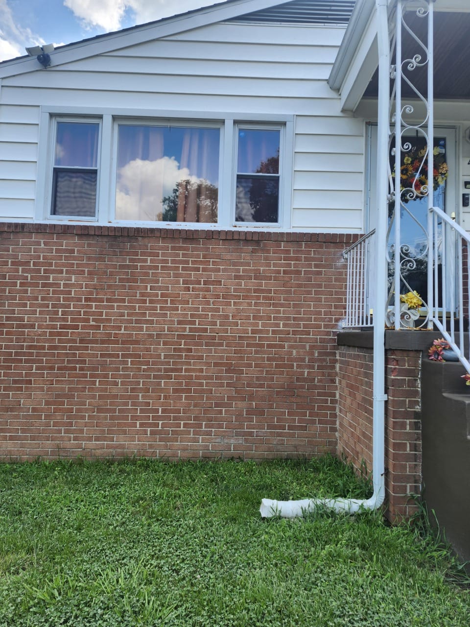Exterior renovation — new siding, porch, and steps