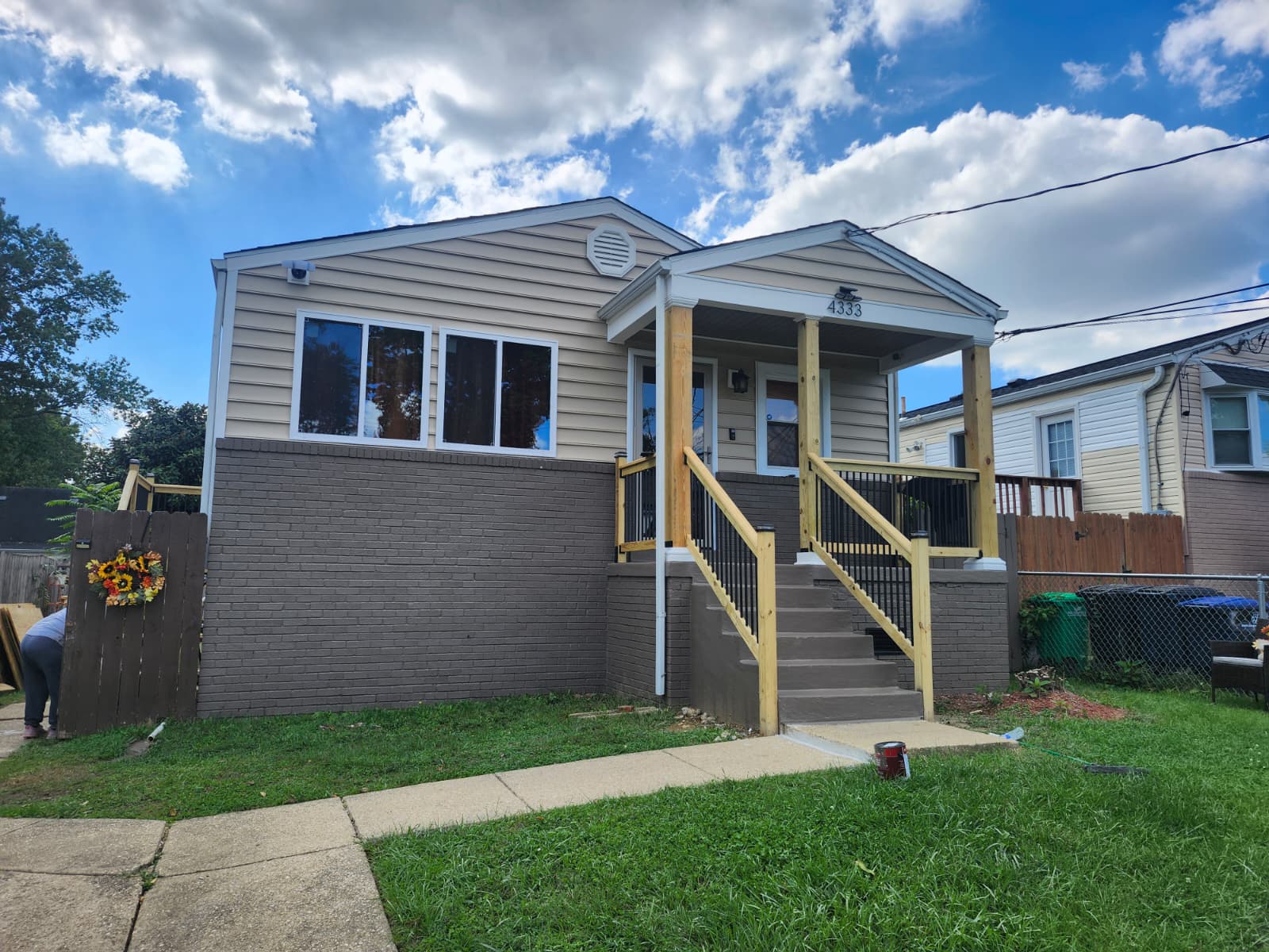 Exterior renovation — new siding, porch, and steps
