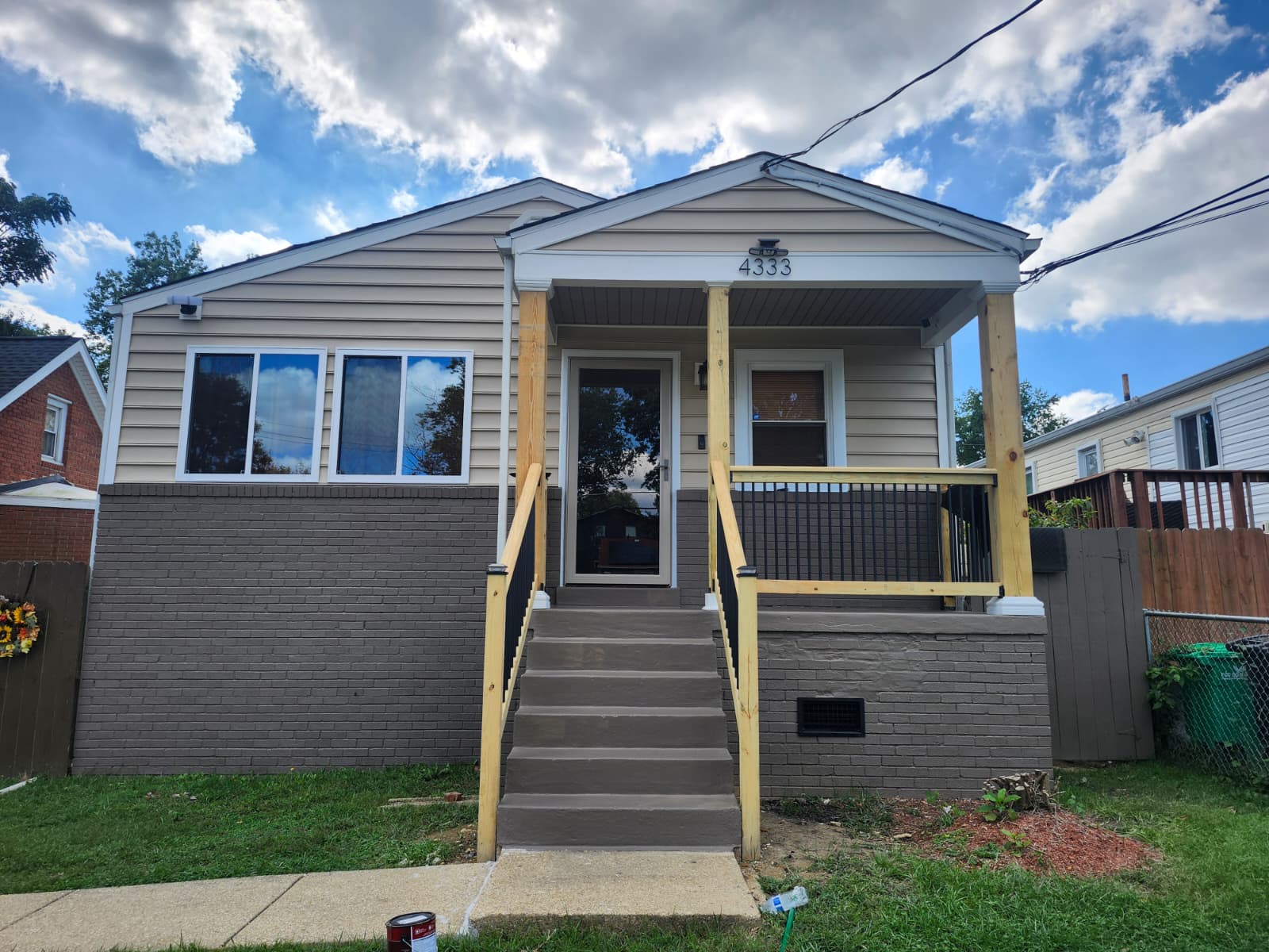 Exterior renovation — new siding, porch, and steps