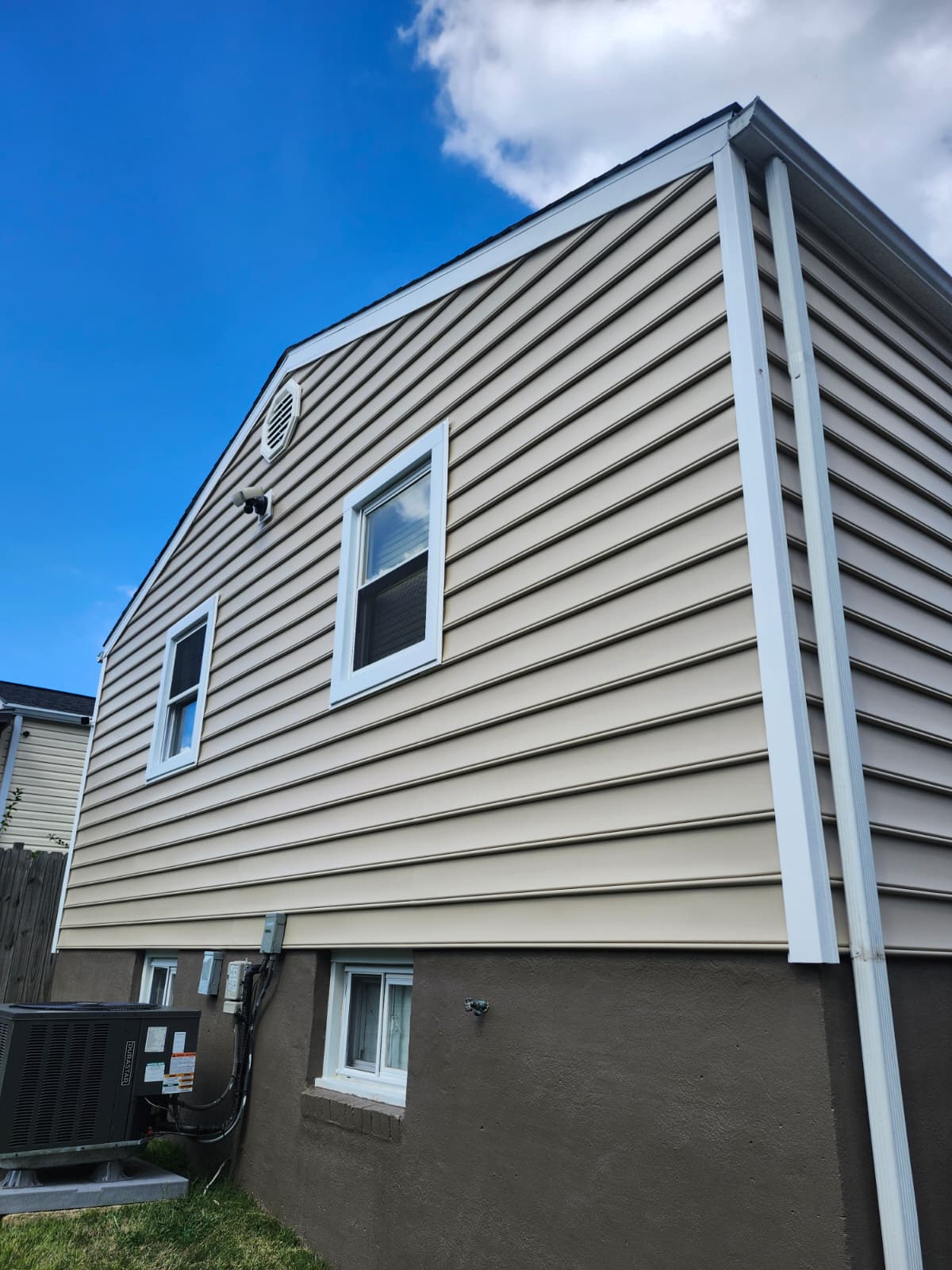 Exterior renovation — new siding, porch, and steps