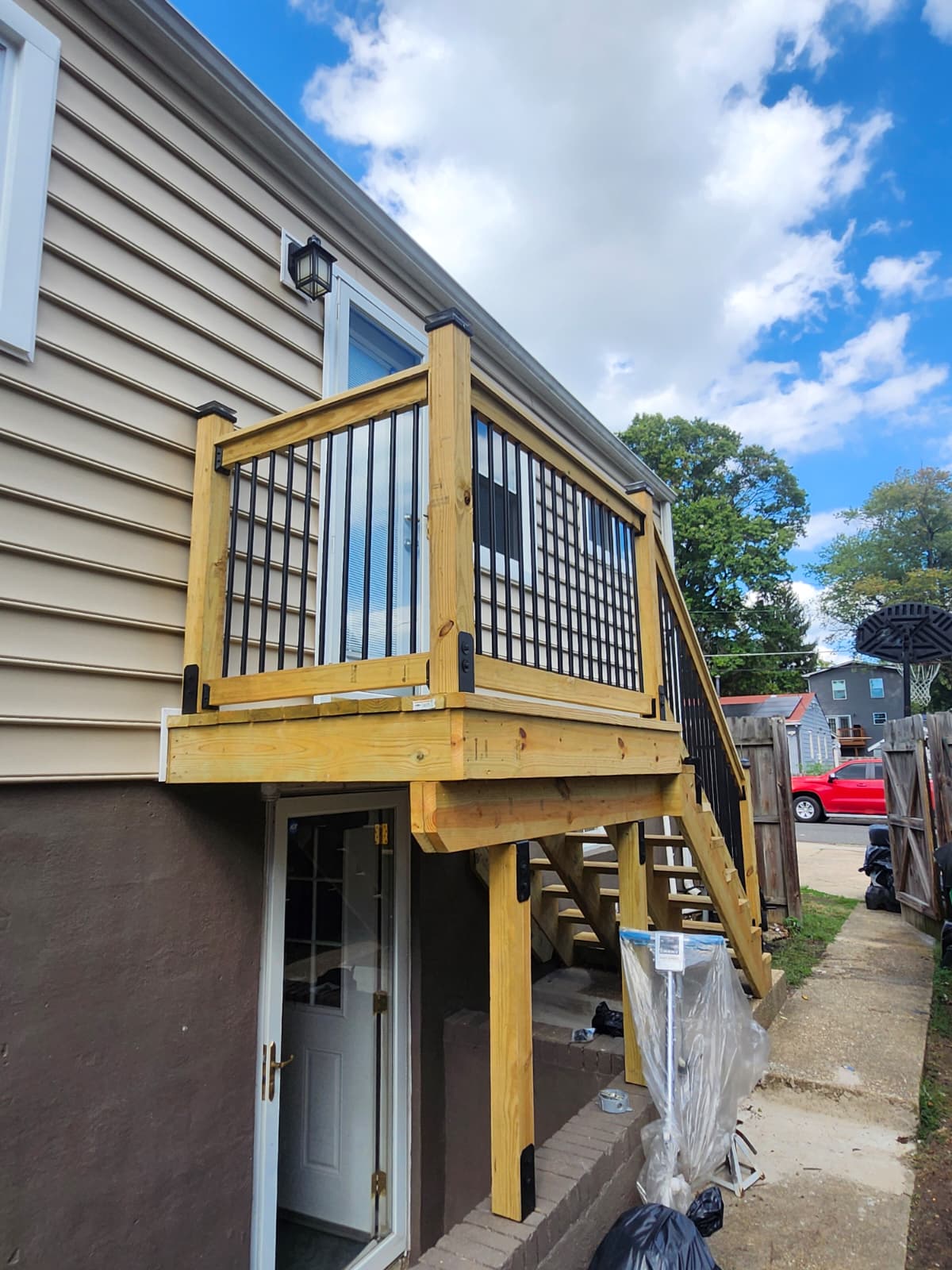 Exterior renovation — new siding, porch, and steps